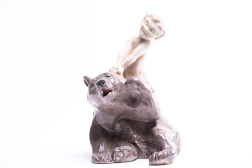 Lot 208 - A Royal Copenhagen figure group of a faun...