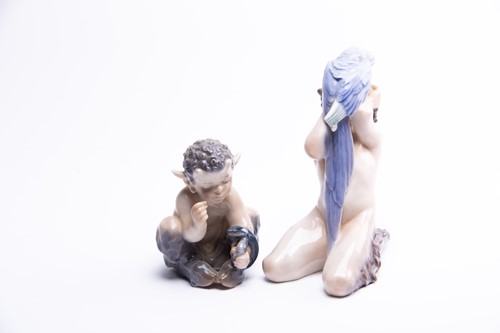 Lot 212 - Two Royal Copenhagen figures: a faun with a...