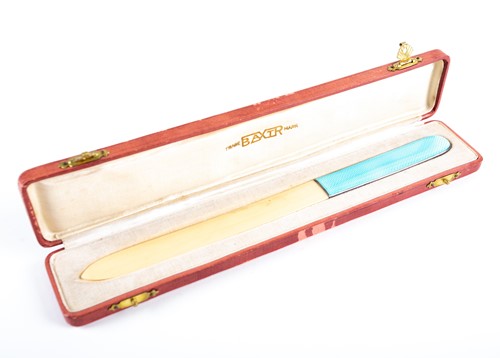 Lot 411 - An early 20th century ivory letter opener,...