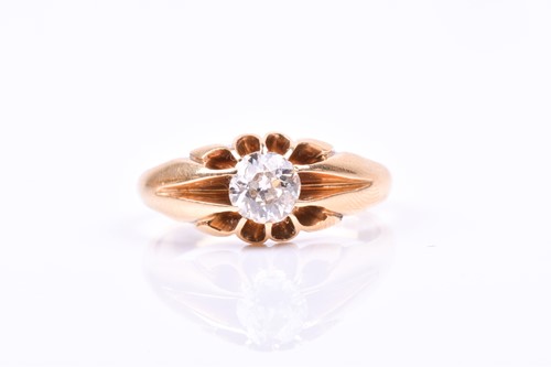 Lot 574 - An 18ct gold diamond solitaire ring, claw-set...