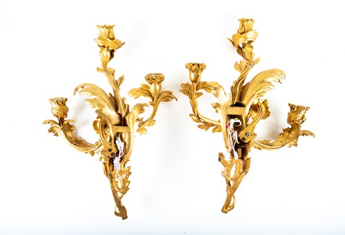 Lot 249 - A pair of rococo style ormolu wall sconces,...