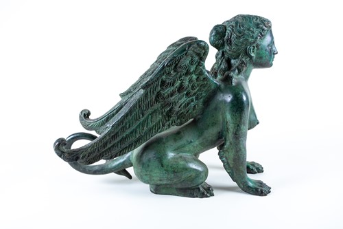 Lot 226 - A patinated bronze of a winged sphinx, 20th...