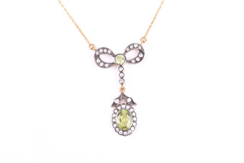 Lot 372 - A diamond and peridot drop pendant necklace,...