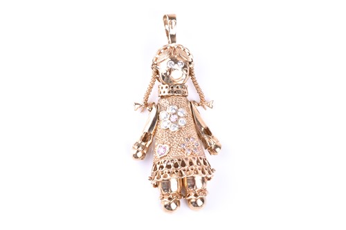 Lot 411 - An articulated 9ct gold rag doll pendant, the...
