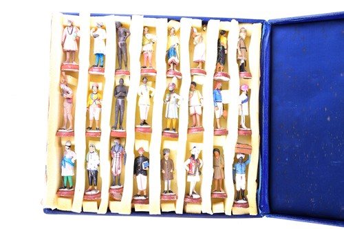 Lot 289 - a boxed collection of painted plaster Indian...