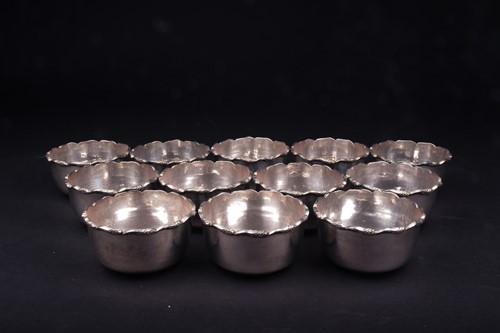 Lot 48 - A set of twelve Continental silver finger...