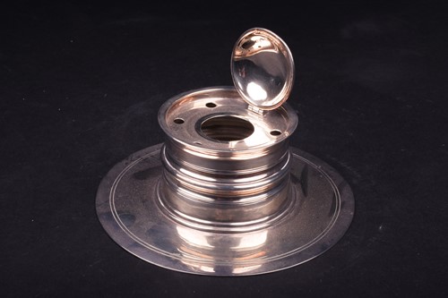 Lot 569 - An Edwardian Scottish silver inkwell,...