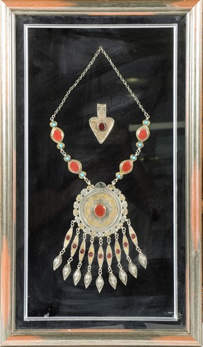 Lot 779 - An Eastern white metal necklace, set with...
