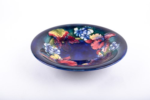 Lot 396 - A Walter Moorcroft open dish in the Orchid...