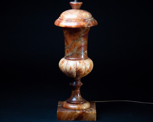 Lot 375 - An Italian hand carved and turned brown onyx...