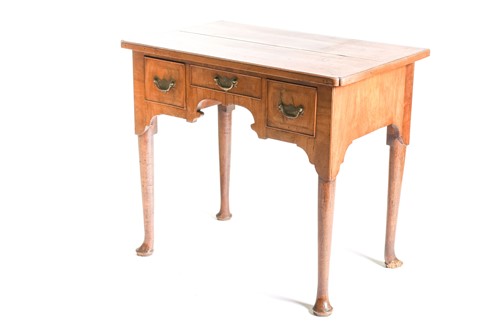 Lot 179 - A Georgian walnut veneered lowboy, 18th...