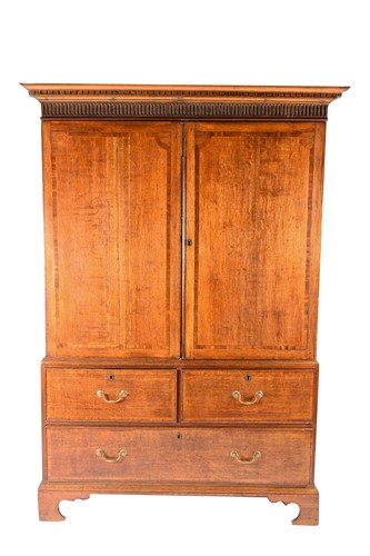 Lot 192 - A Geo III oak linen press, the moulded cornice...