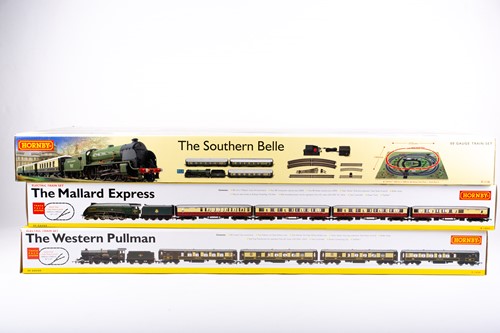 Lot 510 - Three boxed Hornby 00 Gauge train sets,...