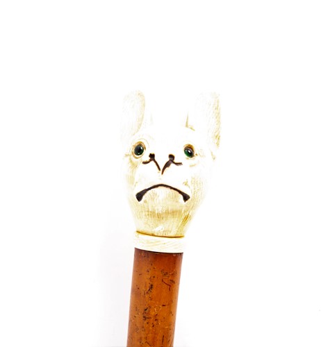 Lot 488 - A 19th century dog head walking cane, the...