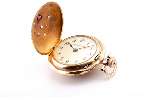 Lot 223 - A yellow metal ladies fob watch, of round...