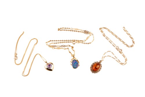 Lot 370 - A yellow metal and opal triplet pendant...