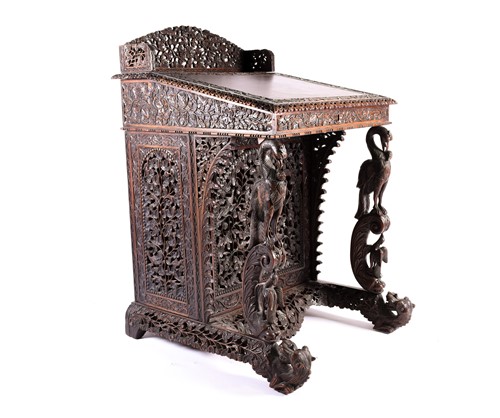 Lot 185 - A 19th century Anglo-Indian rosewood Davenport,...