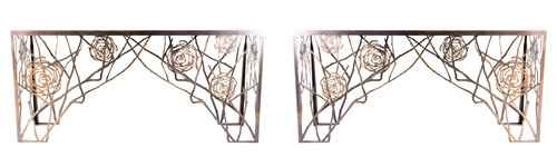 Lot 194 - A pair of contemporary marble and iron console...