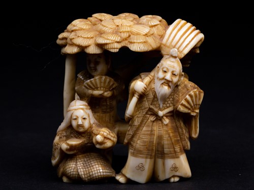 Lot 259 - A Japanese ivory okimono, Meiji period, carved...