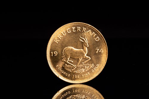 Lot 259 - A 1oz 22ct gold South Africa Krugerrand, 1974.
