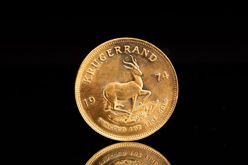 Lot 263 - A 1oz 22ct gold South Africa Krugerrand, 1974.