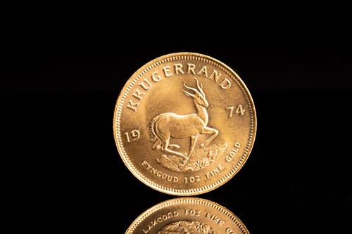 Lot 234 - A 1oz 22ct gold South Africa Krugerrand, 1974.