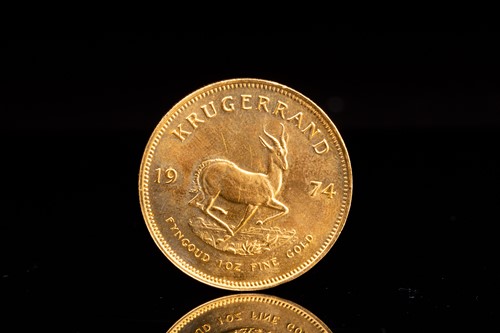 Lot 230 - A 1oz 22ct gold South Africa Krugerrand, 1974.