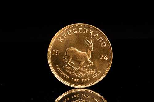 Lot 239 - A 1oz 22ct gold South Africa Krugerrand, 1974.