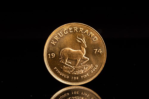 Lot 242 - A 1oz 22ct gold South Africa Krugerrand, 1974.