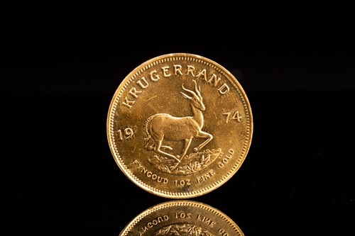 Lot 248 - A 1oz 22ct gold South Africa Krugerrand, 1974.