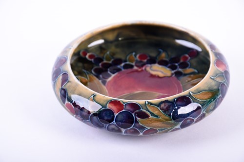 Lot 346 - A William Moorcroft pin tray in the...