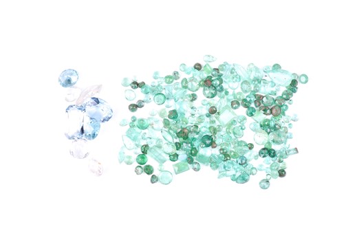 Lot 783 - A group of loose emeralds, various cuts and...