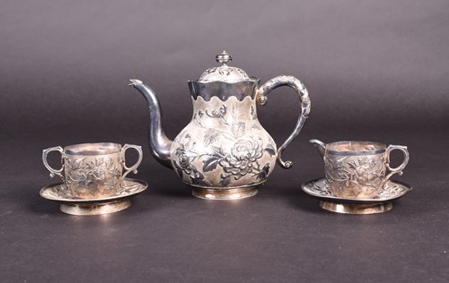 Lot 26 - A Chinese silver part tea set, comprising...