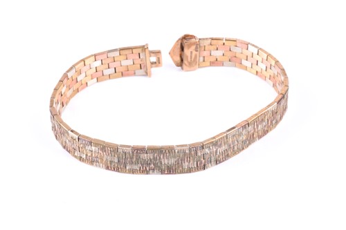 Lot 379 - A 9ct yellow, white, and rose gold ladies...