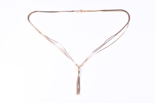 Lot 384 - A tri-coloured gold multi-strand necklace,...