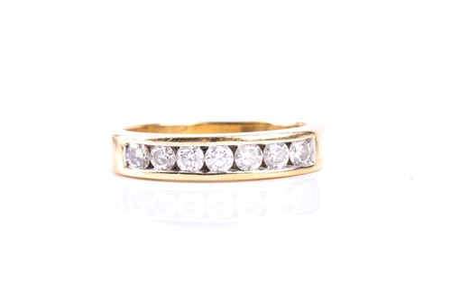 Lot 362 - A seven stone half hoop diamond ring, the...