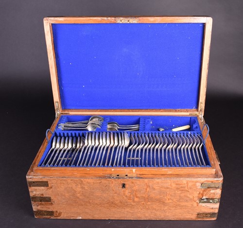 Lot 123 - An oak cased canteen, containing a harlequin...