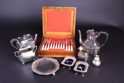 Lot 164 - An Edwardian four-piece silver plate tea set,...