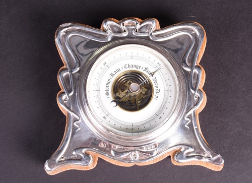 Lot 100 - An Edwardian silver mounted desk barometer,...