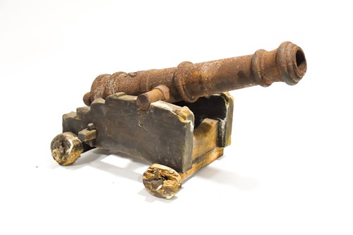 Lot 443 - A 19th century cast iron model of a naval...