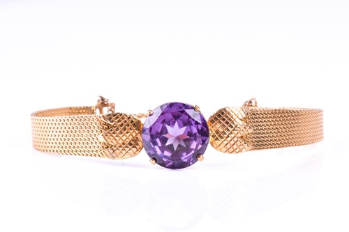 Lot 330 - A yellow metal and synthetic corundum bracelet,...