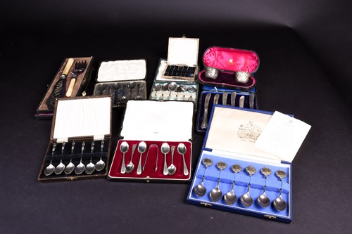 Lot 87 - A large group of cased silver and white metal...