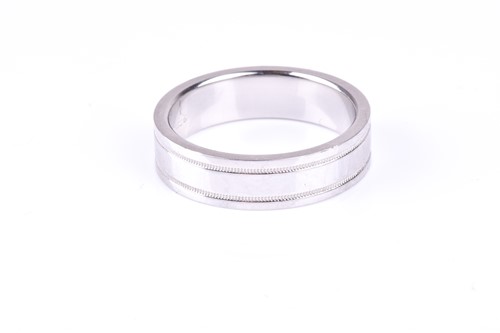 Lot 378 - A gentleman's wedding band, marked Tiffany &...