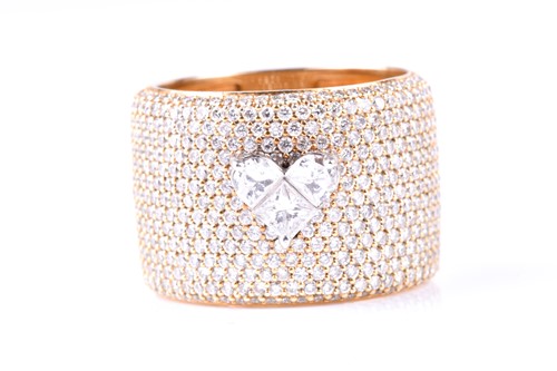 Lot 358 - An 18ct yellow gold and diamond ring, the wide...