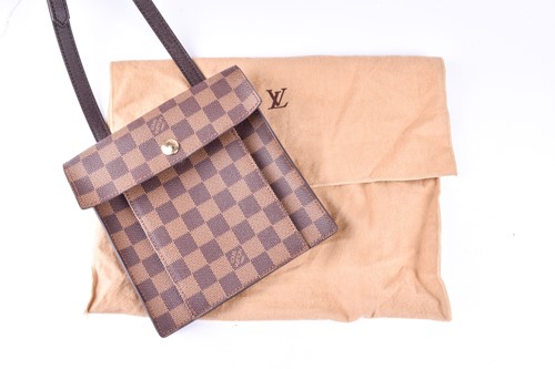 Lot 322 - A small Louis Vuitton shoulder bag, with...