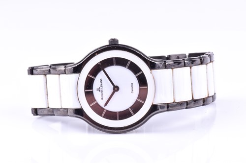 Lot 202 - A Jacques Lemans ceramic wristwatch, the black...