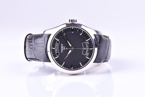 Lot 203 - A Tissot automatic stainless steel wristwatch,...