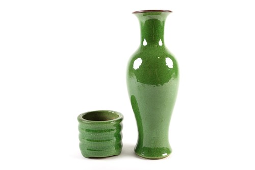 Lot 262 - A Chinese green glazed vase, of slender...