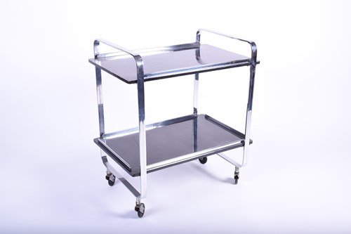Lot 170 - An Art Deco style chrome and lacquered...