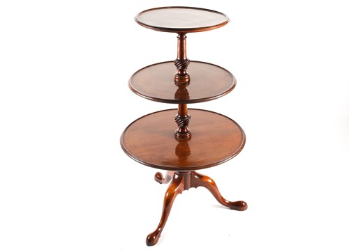 Lot 157 - A Georgian mahogany three tier dumb waiter,...